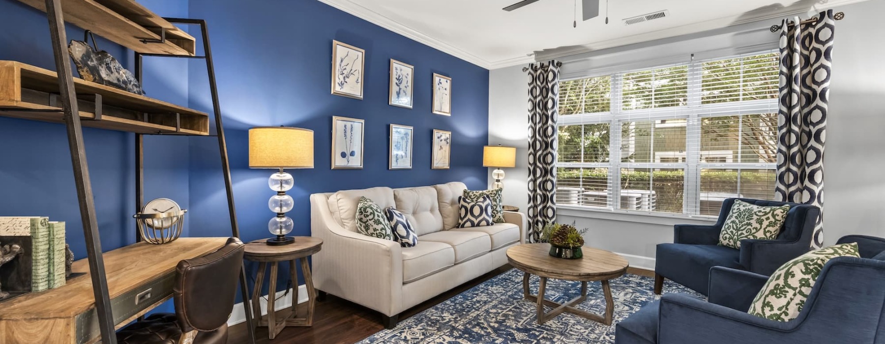 living area that includes ample seating spaces and bright lighting
